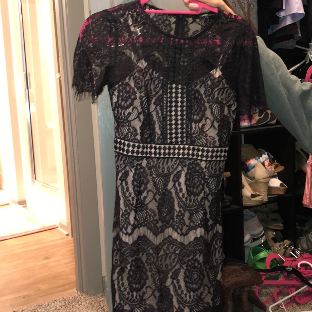 Cute black lace dress with cream under layer